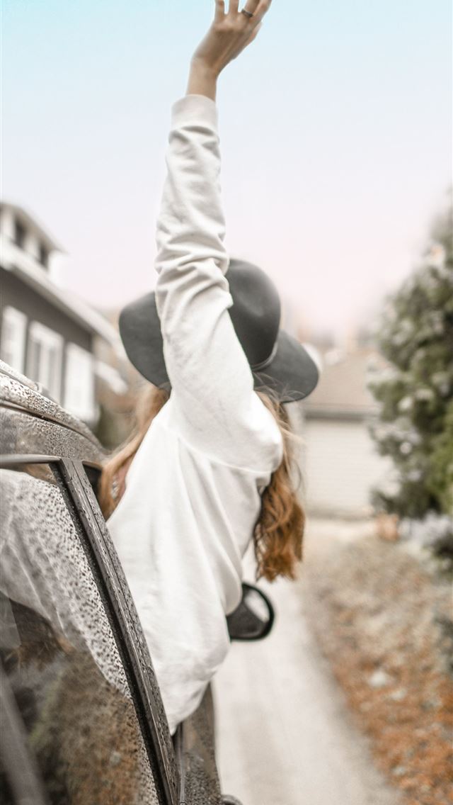 640x1136 woman rising left hand on vehicle window during da... - spring iPhone Wallpaper