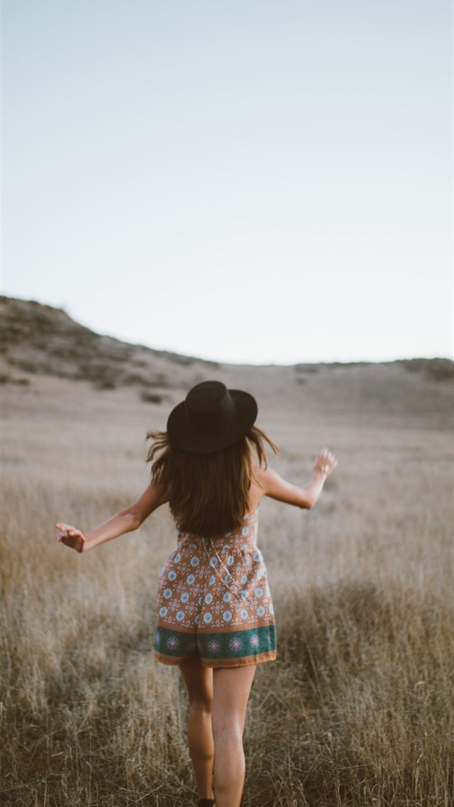 640x1136 woman wearing brown and green floral romper walkin... - girls iPhone Wallpaper