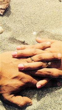 man and woman holding each others hand wallpaper