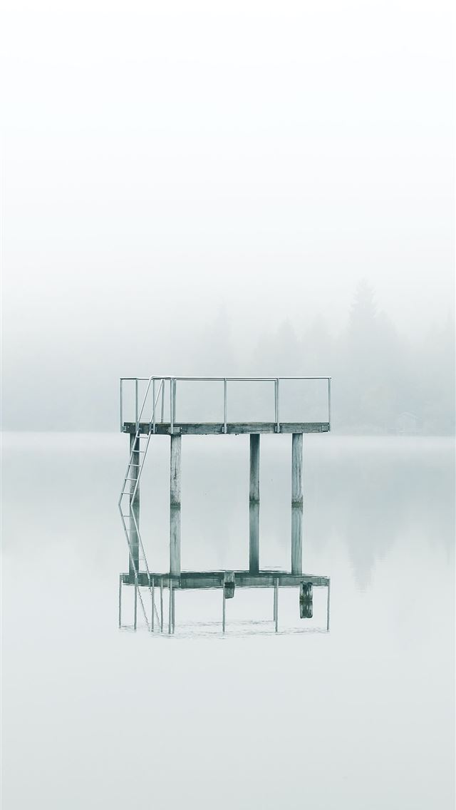 640x1136 photography gray metal tower near body of water du... - germany iPhone Wallpaper