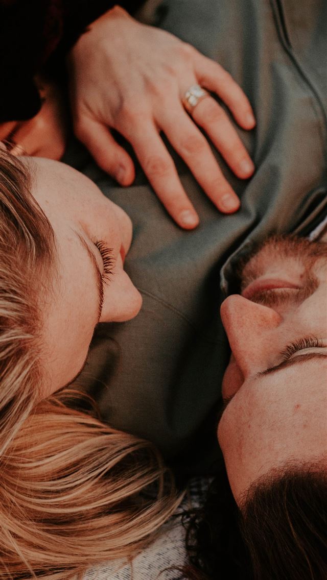 640x1136 a woman stares into a man's eyes lovingly - love iPhone Wallpaper