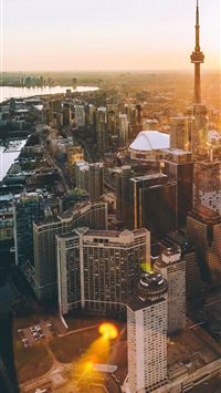 aerial photo of city during golden hour wallpaper