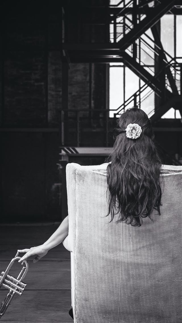 640x1136 woman sitting on chair holding trumpet - music iPhone Wallpaper