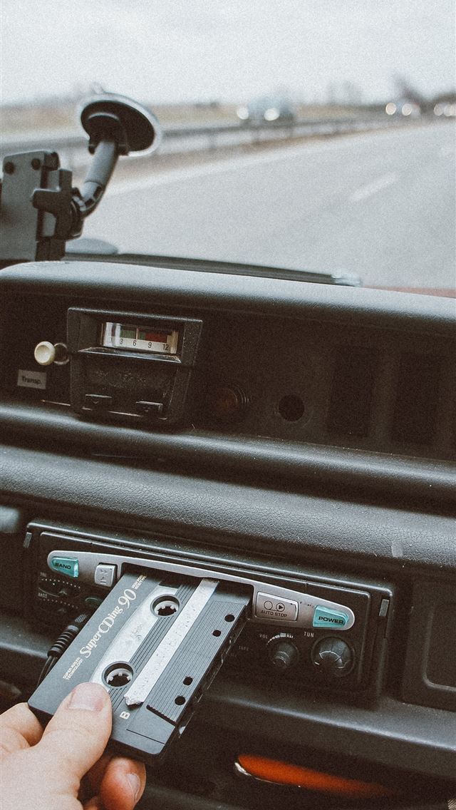 640x1136 person inserting cassette tape on cassette player - denmark iPhone Wallpaper