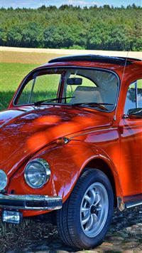 Volkswagen Beetle red classic car Samsung Galaxy S... wallpaper
