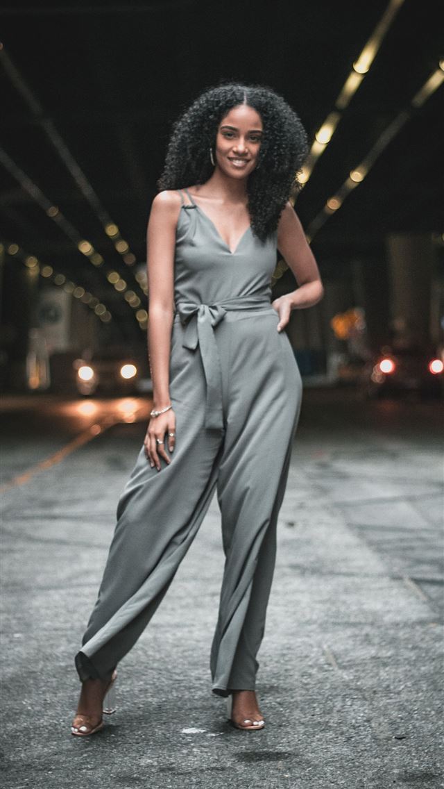 1284x2778 woman standing in the middle of the road - beautiful iPhone Wallpaper