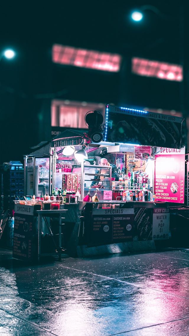 1125x2436 black and gray food stand during nighttime - canada iPhone Wallpaper