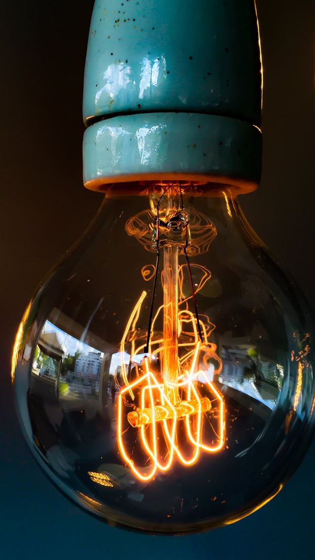 1284x2778 turned on clear glass light bulb - modern iPhone Wallpaper