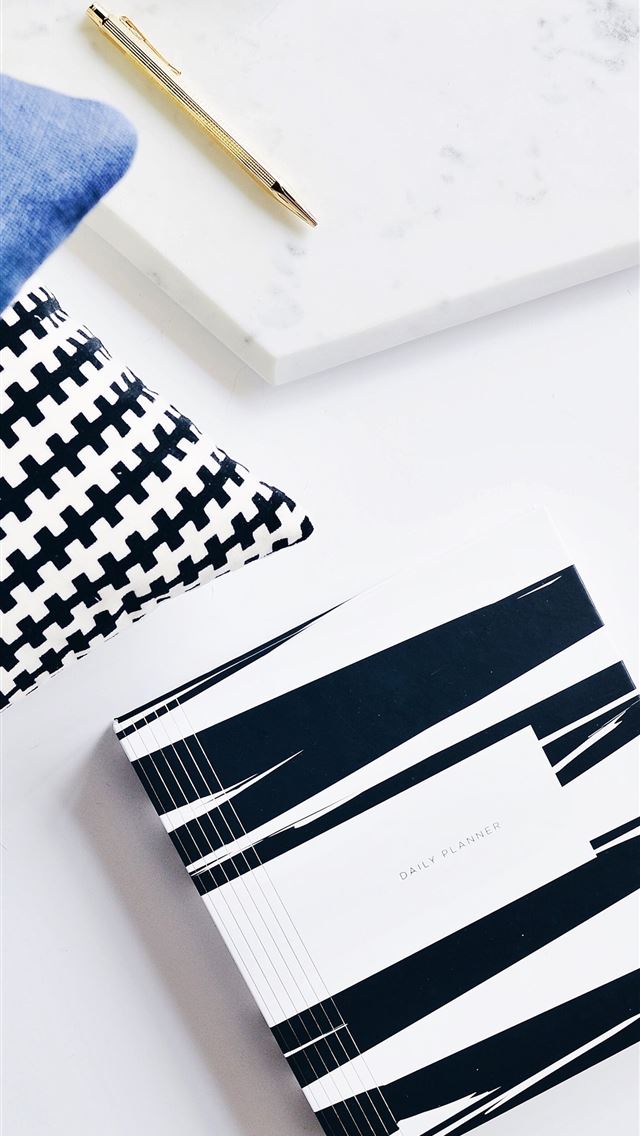 1284x2778 gray retractable pen beside blue textile - canada iPhone Wallpaper