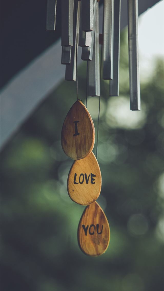 1284x2778 focus photography of gray and brown wind chimes - love iPhone Wallpaper