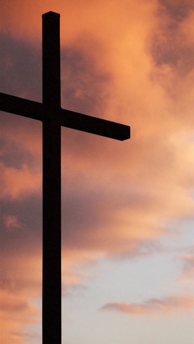 1284x2778 silhouette of large cross under orange sky - clouds iPhone Wallpaper
