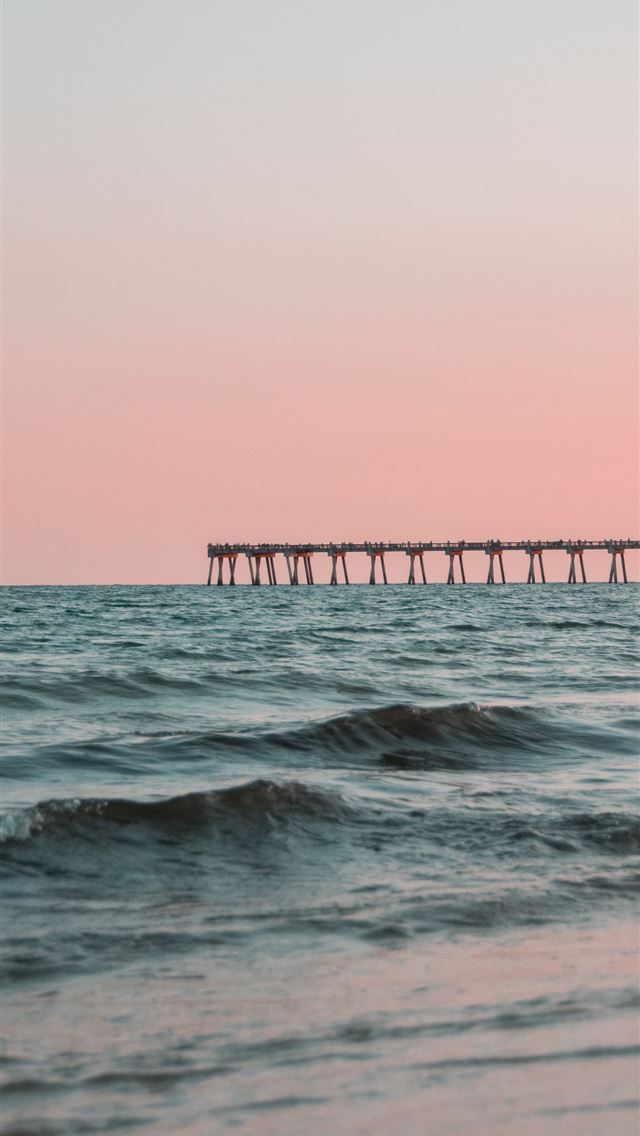 1284x2778 long exposure photography of ocean waves - pink iPhone Wallpaper