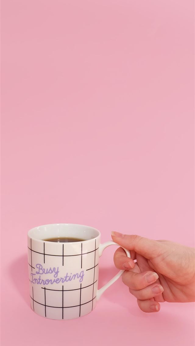 1284x2778 White Mug with a hand - pink iPhone Wallpaper