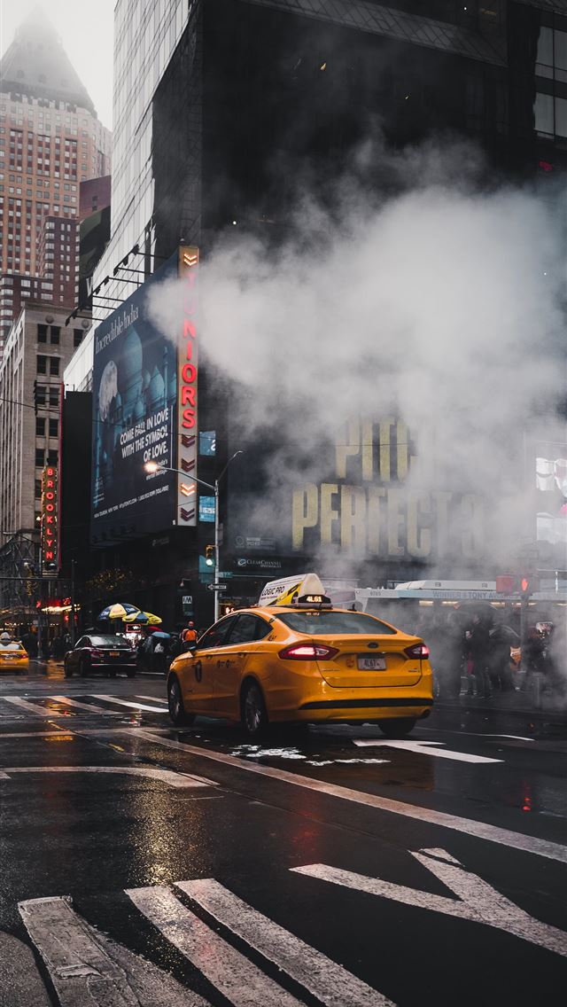 1284x2778 yellow taxi sedan on gray concrete street passed t... - new york city iPhone Wallpaper