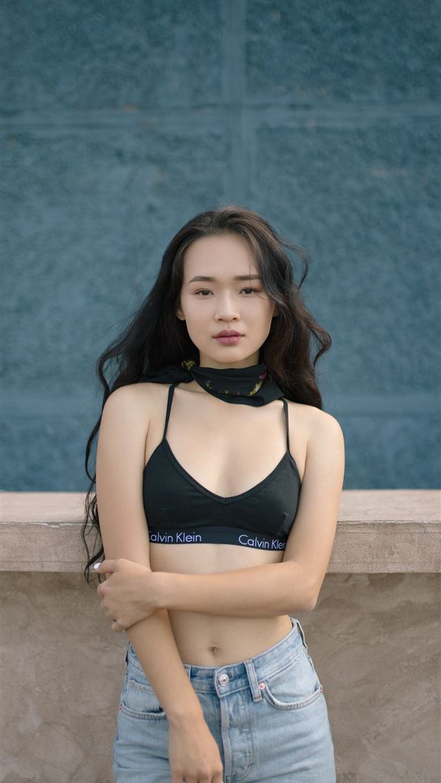 1284x2778 woman standing in front of wall - girl iPhone Wallpaper