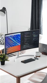 turned on flat screen TV wallpaper