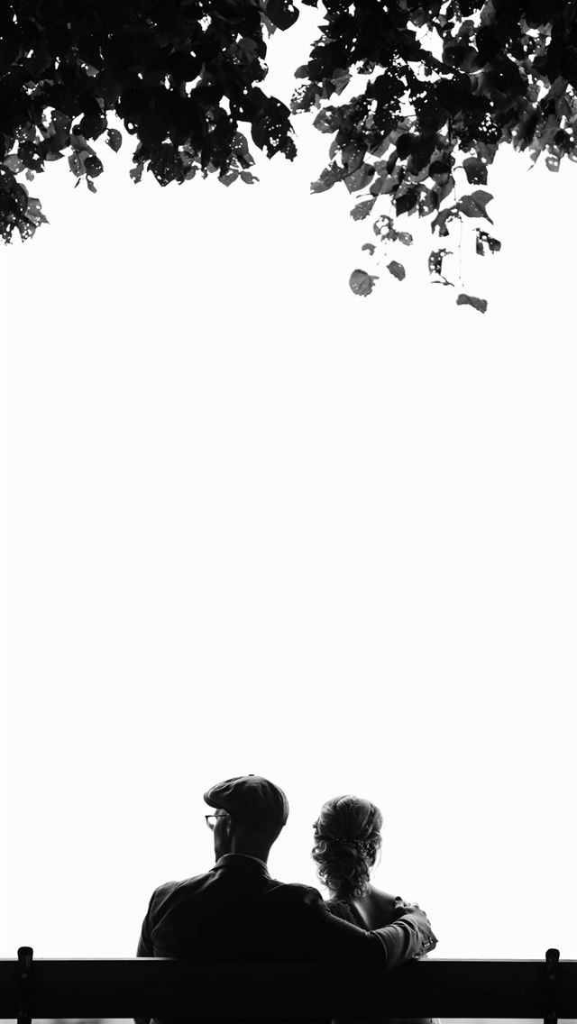 1284x2778 couple sitting on bench under tree grayscale photo... - love iPhone Wallpaper