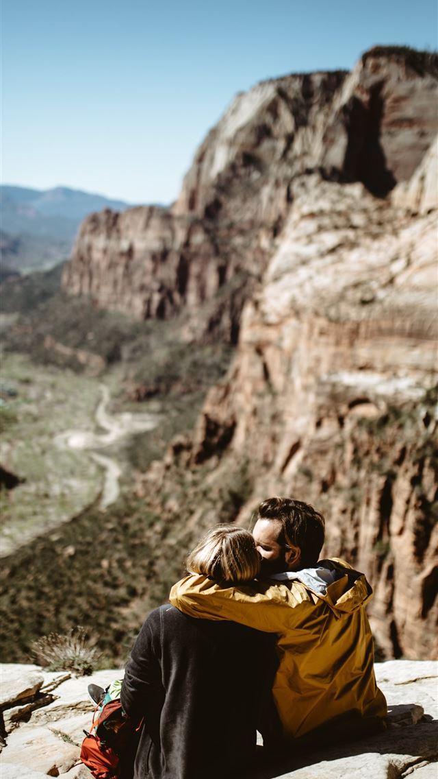 1284x2778 selective focus photography of couple sitting on r... - love iPhone Wallpaper