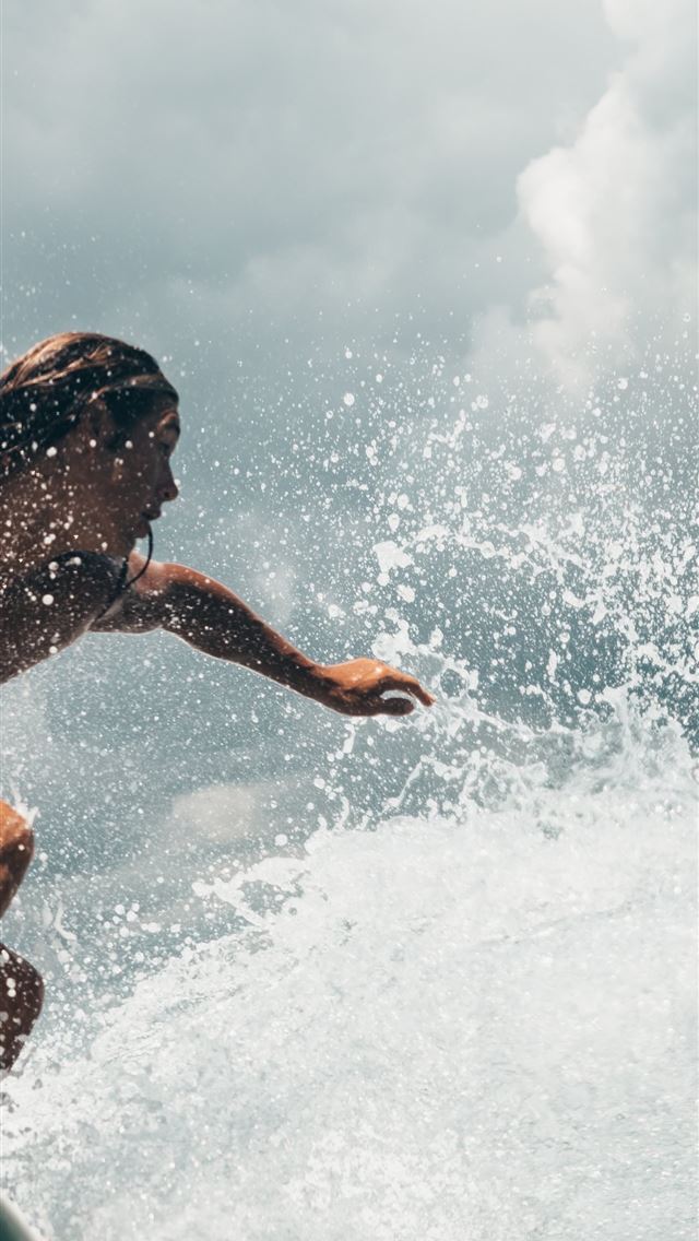 1284x2778 man surfing - indonesia iPhone Wallpaper