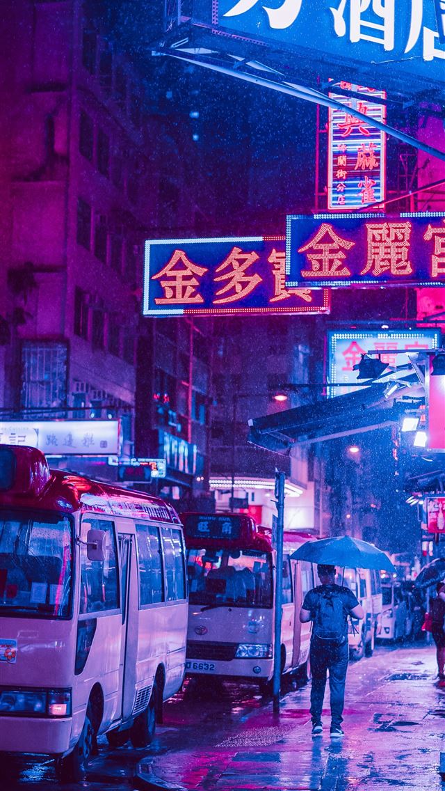 1284x2778 man walking on sidewalk under signage - neon iPhone Wallpaper