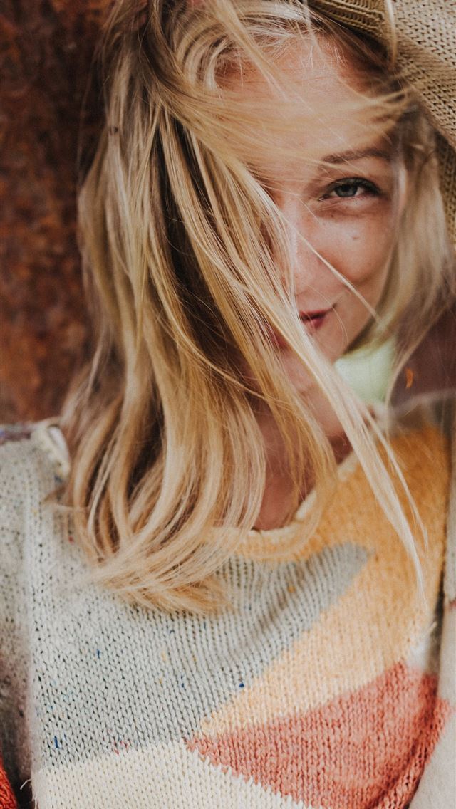 1284x2778 woman standing beside brown tree trunk -  iphone 13 Wallpaper