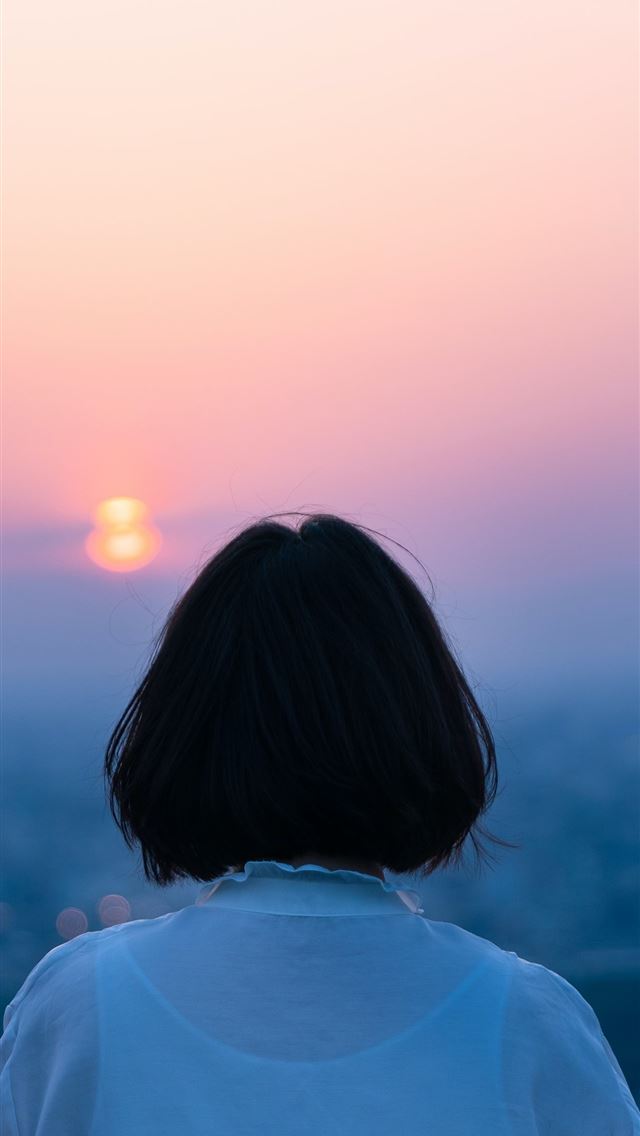 1284x2778 woman in white top under cloudy sky - japan iPhone Wallpaper