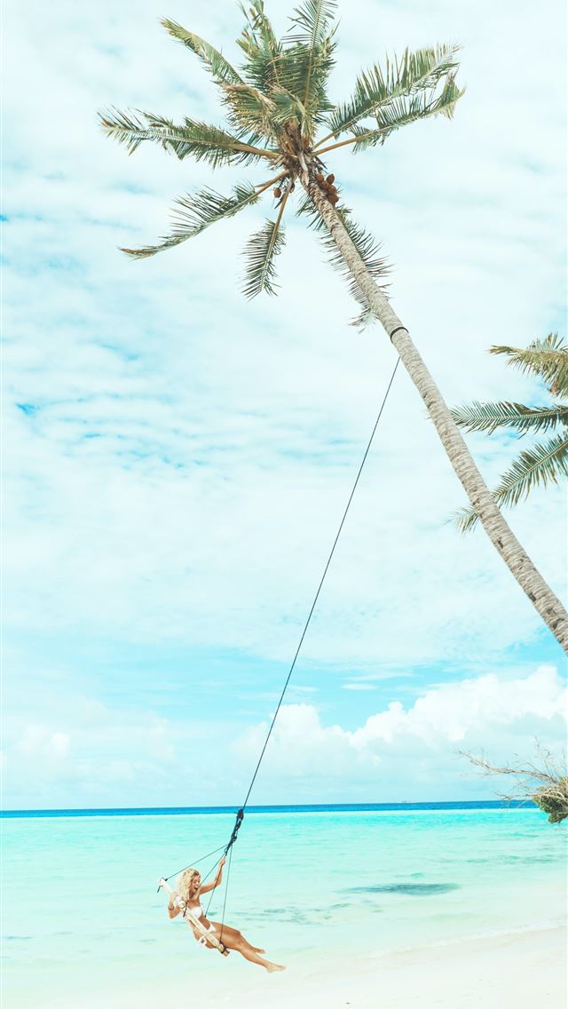 1284x2778 woman swing under coconut tree - summer iPhone Wallpaper