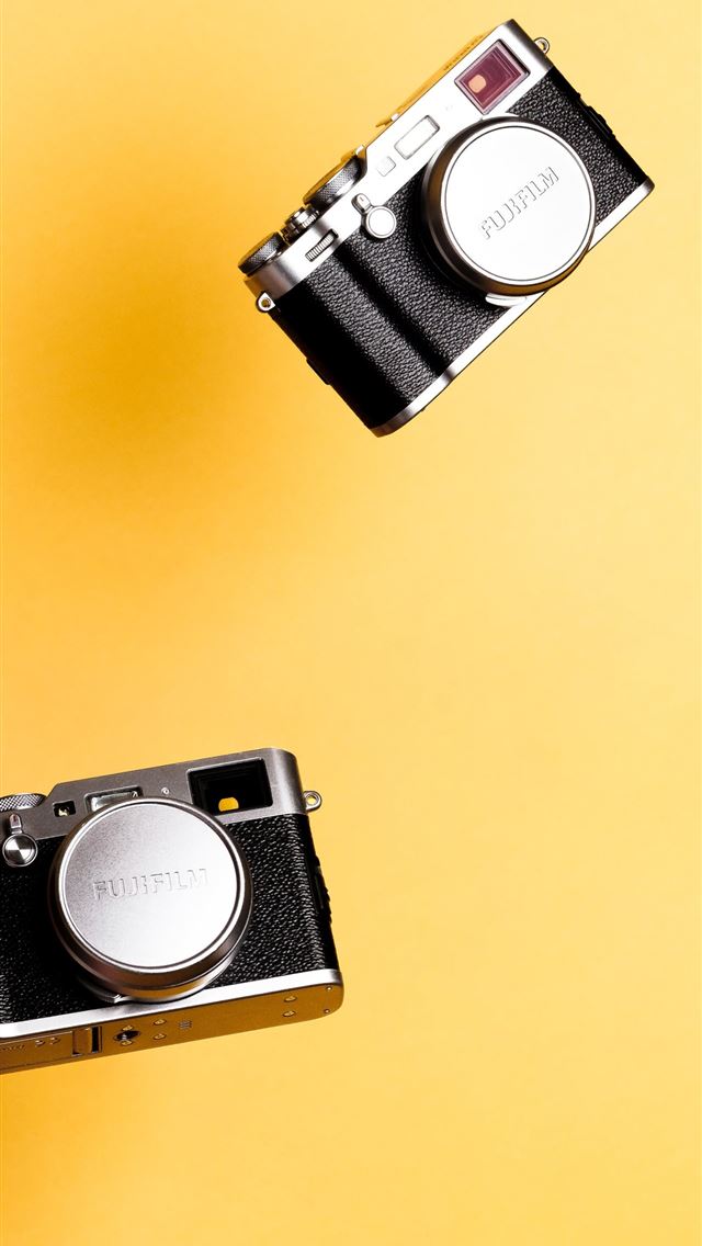 1284x2778 black film cameras - yellow iPhone Wallpaper