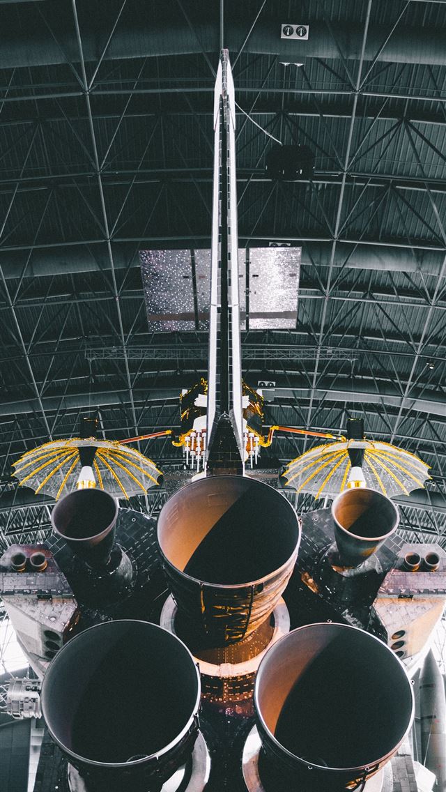 1284x2778 photo of rocket ship inside warehouse - satellite iPhone Wallpaper