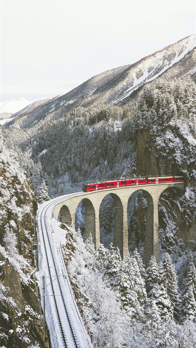 1284x2778 approaching red train across mountains -  iphone 13 Wallpaper