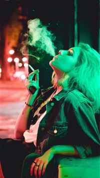 woman smoking during nighttime wallpaper