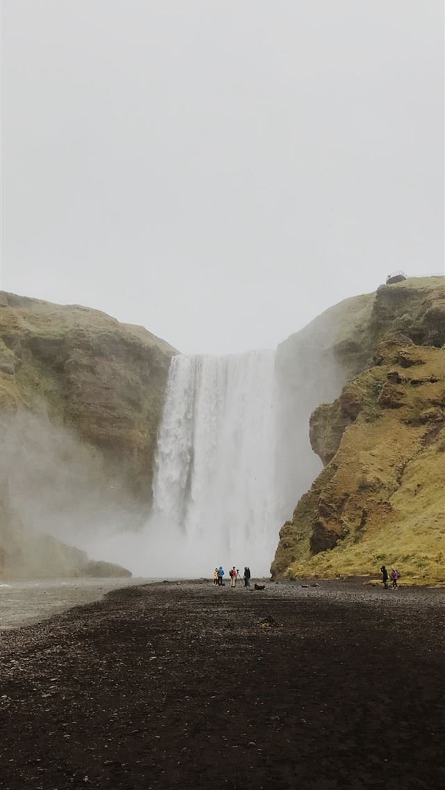 1284x2778 people near waterfalls -  iphone 13 Wallpaper