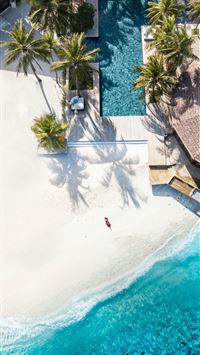 aerial view photography of seashore and pool wallpaper