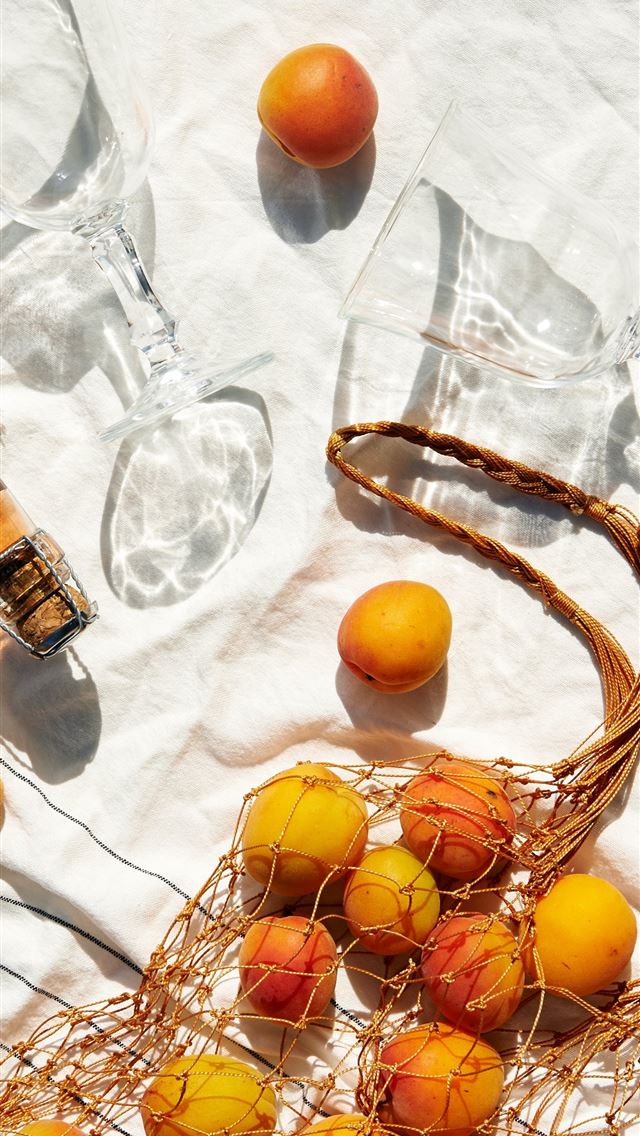 1284x2778 orange fruit on white textiles -  iphone 13 Wallpaper