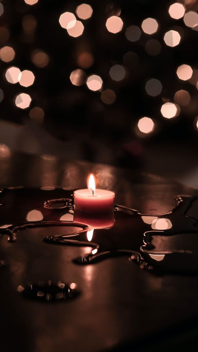 1284x2778 tilt shift lens photography of tealight candle - los angeles iPhone Wallpaper