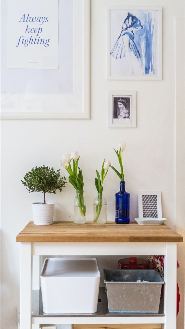 1284x2778 white and brown wooden end table near wall inside ... -  iphone 13 Wallpaper