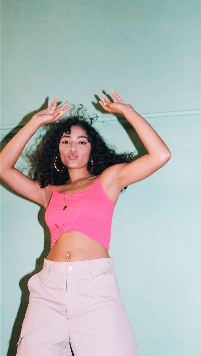 1284x2778 woman in pink tank top and white shorts - los angeles iPhone Wallpaper