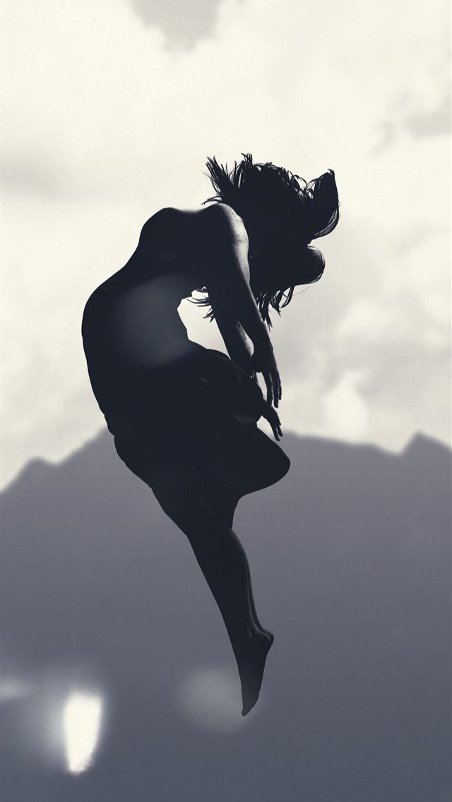 1284x2778 silhouette of person jumping in mid air during day... - morocco iPhone Wallpaper
