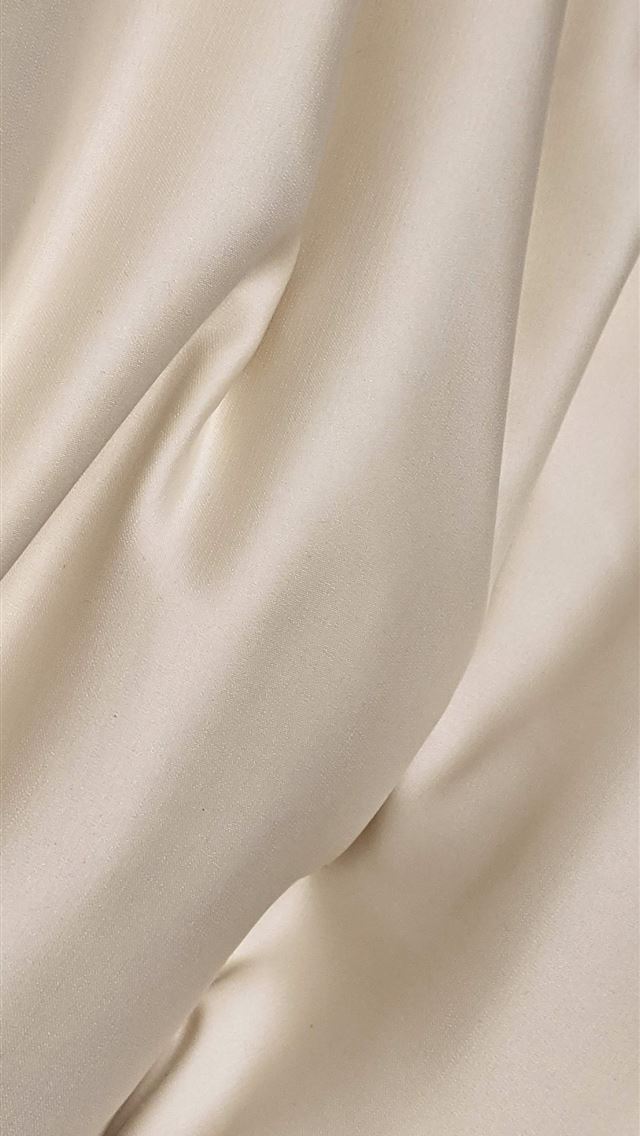 1284x2778 white textile on brown wooden table -  iPhone Wallpaper