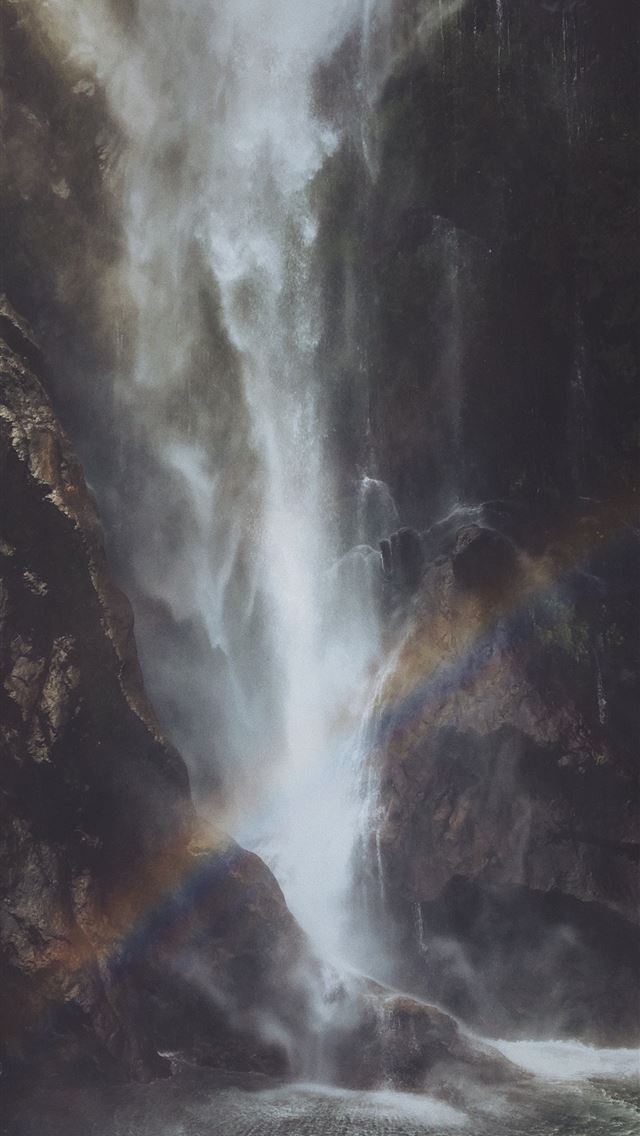 1284x2778 rainbow near the waterfalls - milford sound iPhone Wallpaper