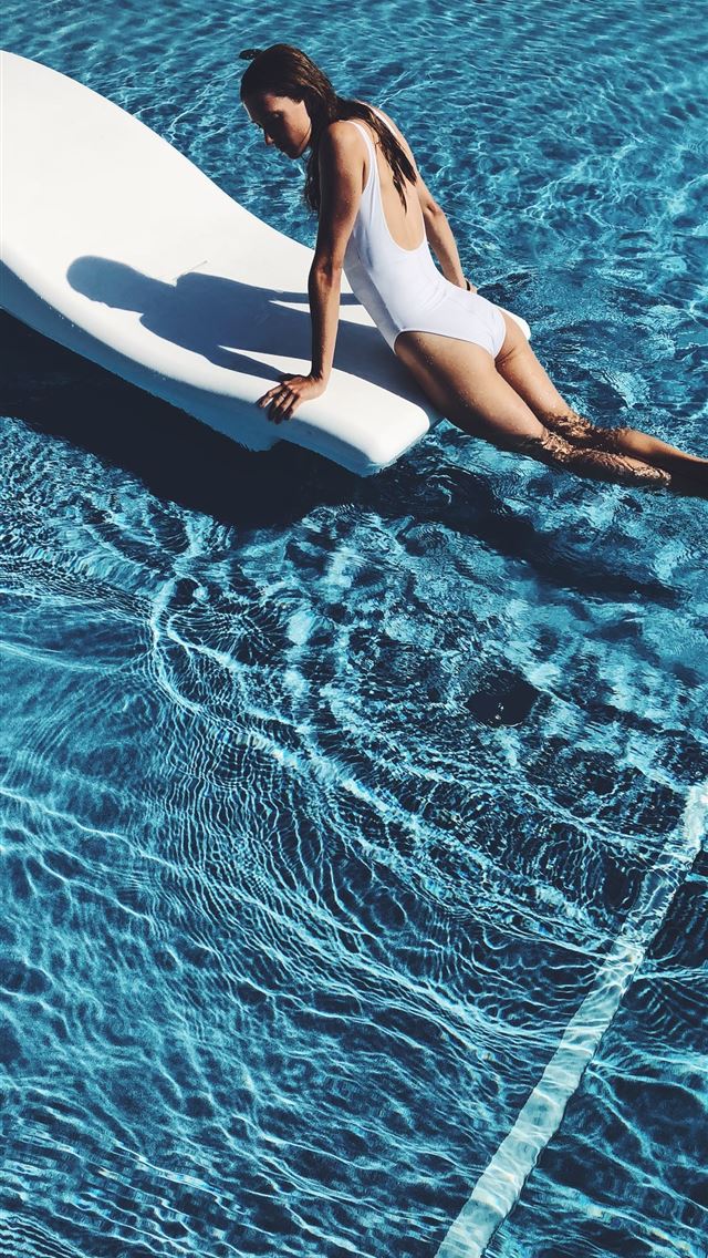 1284x2778 woman lying on white lounge chair in the middle of... - beauty iPhone Wallpaper