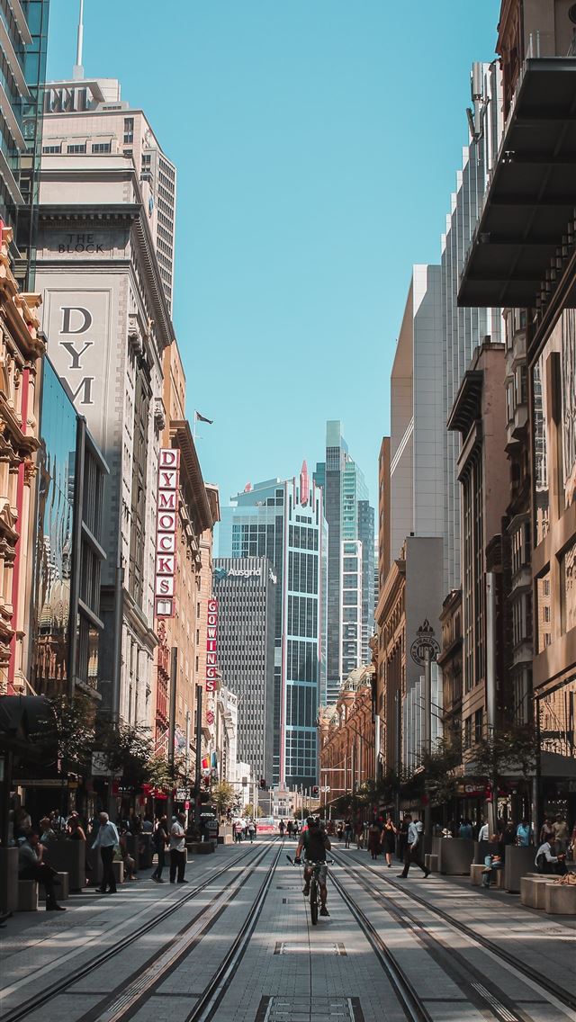 1284x2778 people on marker beside road - australia iPhone Wallpaper