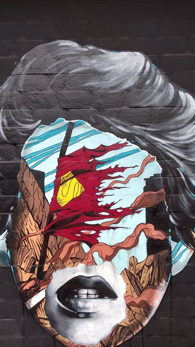 1284x2778 face with red and yellow Supreme flag graffiti wal... - germany iPhone Wallpaper