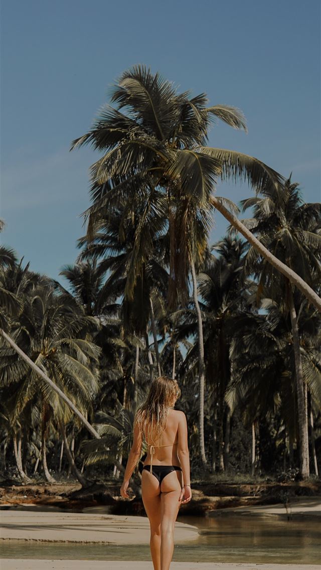 1284x2778 woman in black pantie standing on seashore - beach iPhone Wallpaper