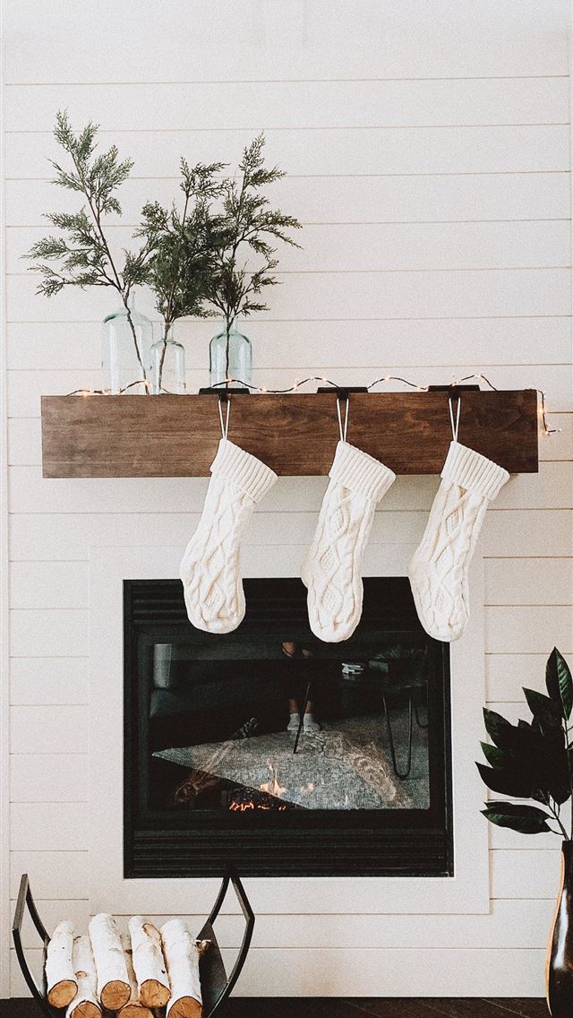 1284x2778 firewood on rack near fireplace - winter iPhone Wallpaper