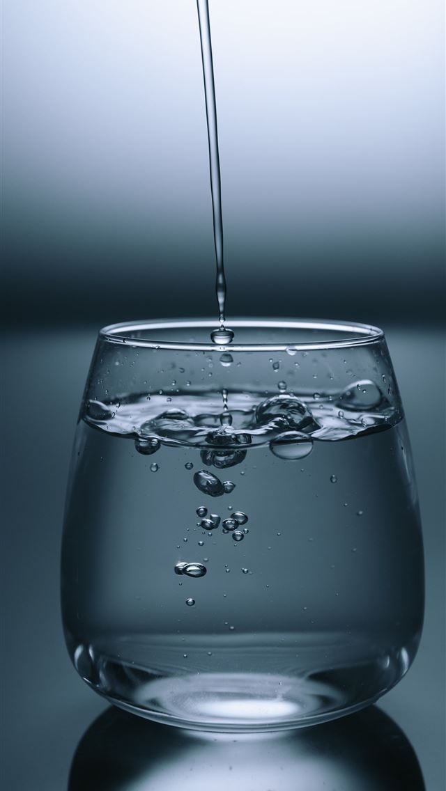 1284x2778 clear drinking glass on gray surface - portugal iPhone Wallpaper