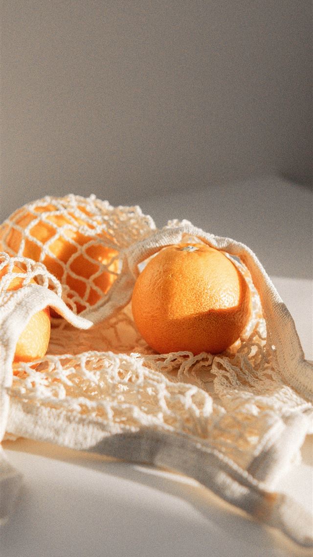 1284x2778 brown and white bread on white textile - fruits iPhone Wallpaper