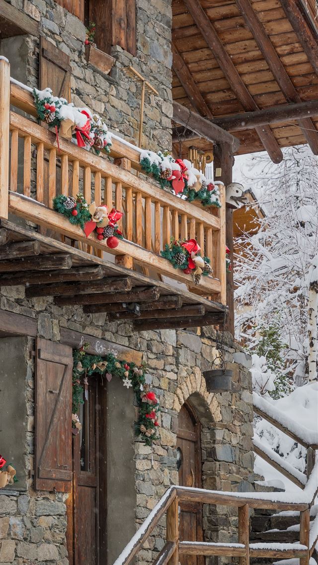 1284x2778 brown and gray house during winter - france iPhone Wallpaper