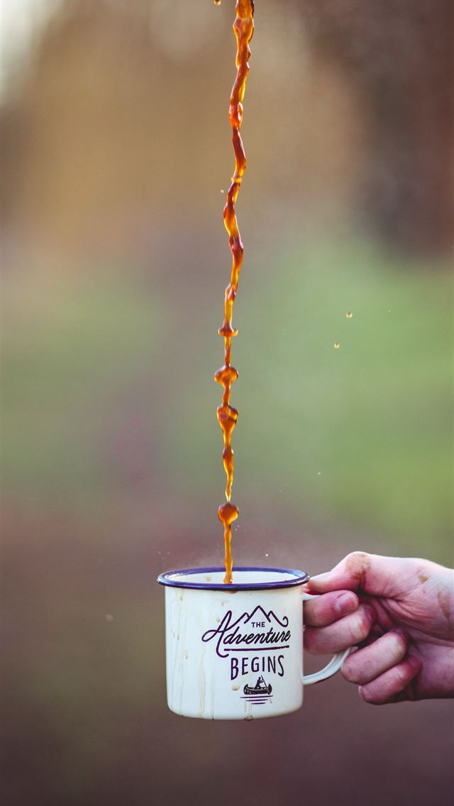 1284x2778 brown liquid poured on white enamel cup - united kingdom iPhone Wallpaper