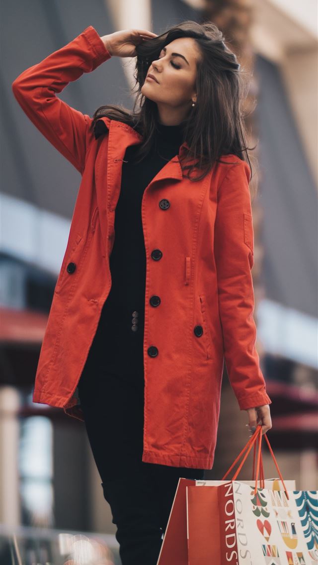 1284x2778 woman holding a paper bag walking on street - dallas iPhone Wallpaper